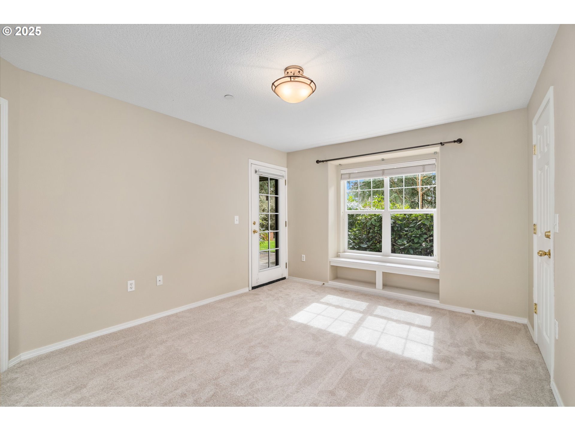 30406 Southwest Ruth Street, Unit 78 Wilsonville, OR 97070 - Photo 18 of 45 a view of an empty room with a window