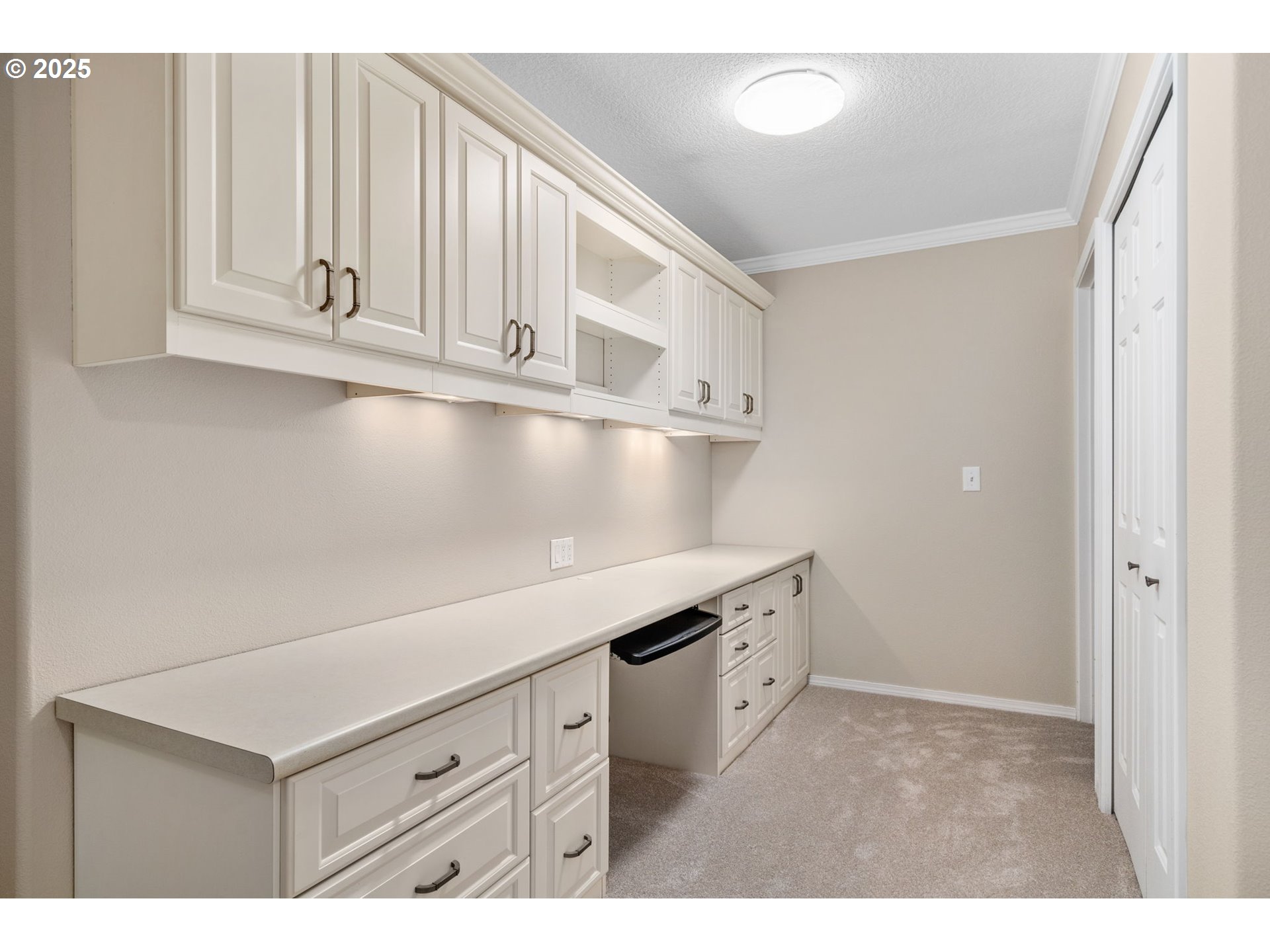 30406 Southwest Ruth Street, Unit 78 Wilsonville, OR 97070 - Photo 21 of 45 a kitchen with granite countertop white cabinets and white appliances