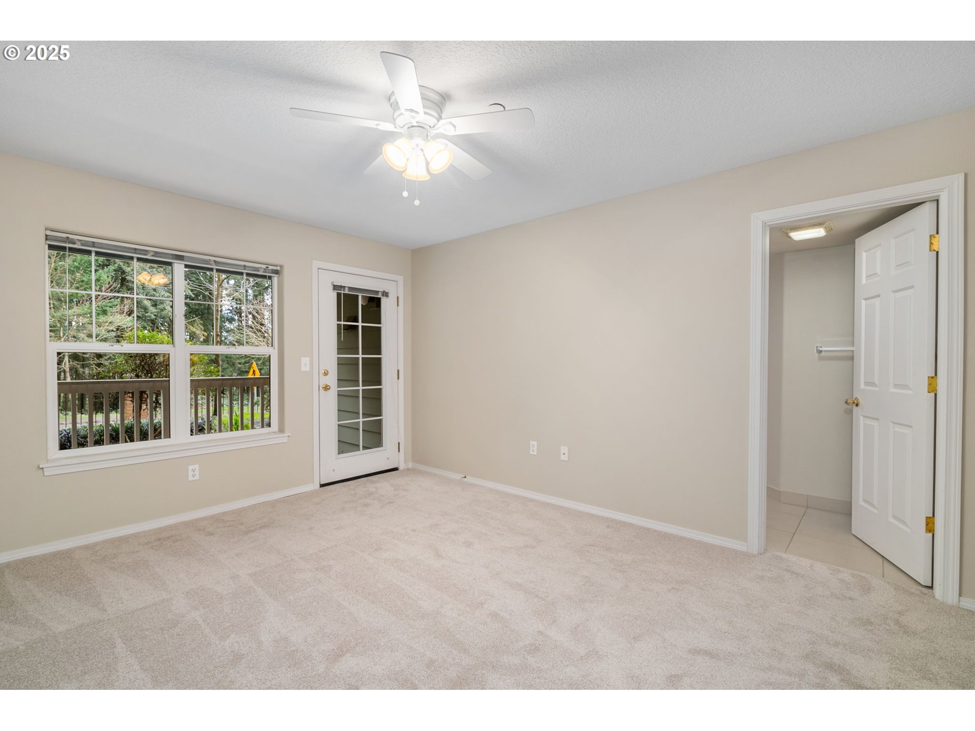 30406 Southwest Ruth Street, Unit 78 Wilsonville, OR 97070 - Photo 26 of 45 a view of an empty room with a window