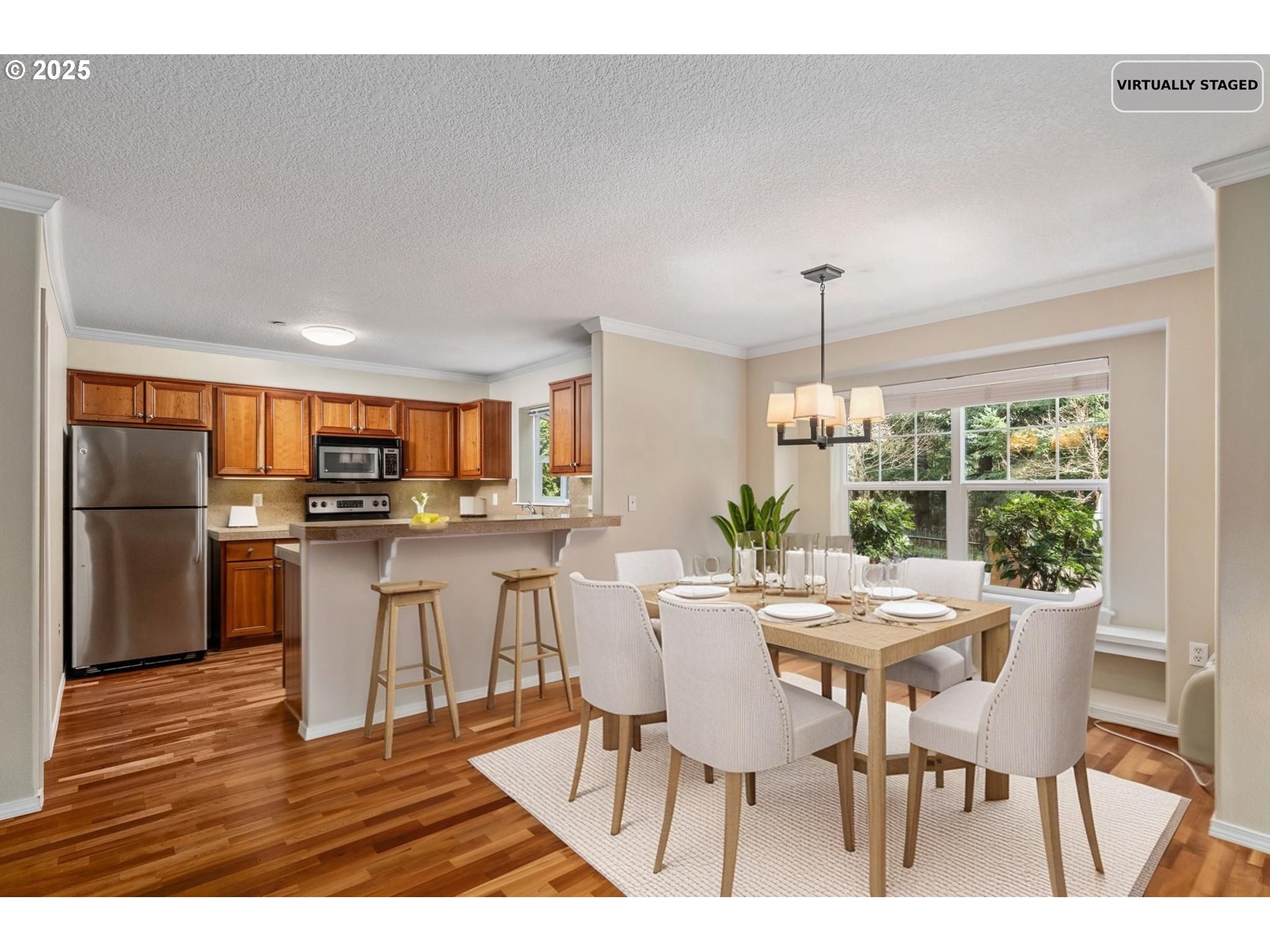 30406 Southwest Ruth Street, Unit 78 Wilsonville, OR 97070 - Photo 44 of 45 a view of a dining room with furniture window and wooden floor