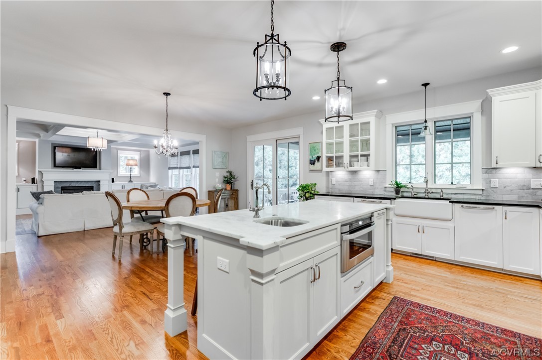 206 Running Cedar Lane Henrico, VA 23229 - Photo 12 of 33 a kitchen with stainless steel appliances granite countertop a stove and chairs