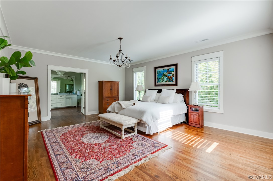 206 Running Cedar Lane Henrico, VA 23229 - Photo 23 of 33 a bedroom with a bed dresser and a window