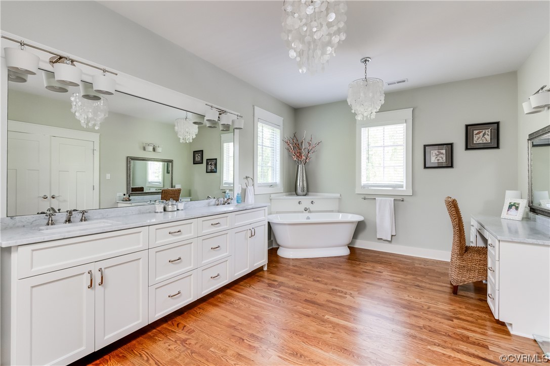 206 Running Cedar Lane Henrico, VA 23229 - Photo 27 of 33 a large spacious bathroom with a large tub sink and window