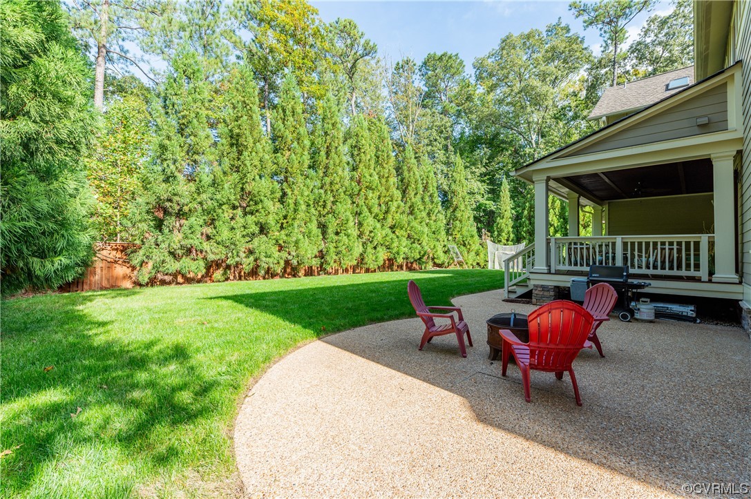 206 Running Cedar Lane Henrico, VA 23229 - Photo 32 of 33 a view of backyard with a table and chairs