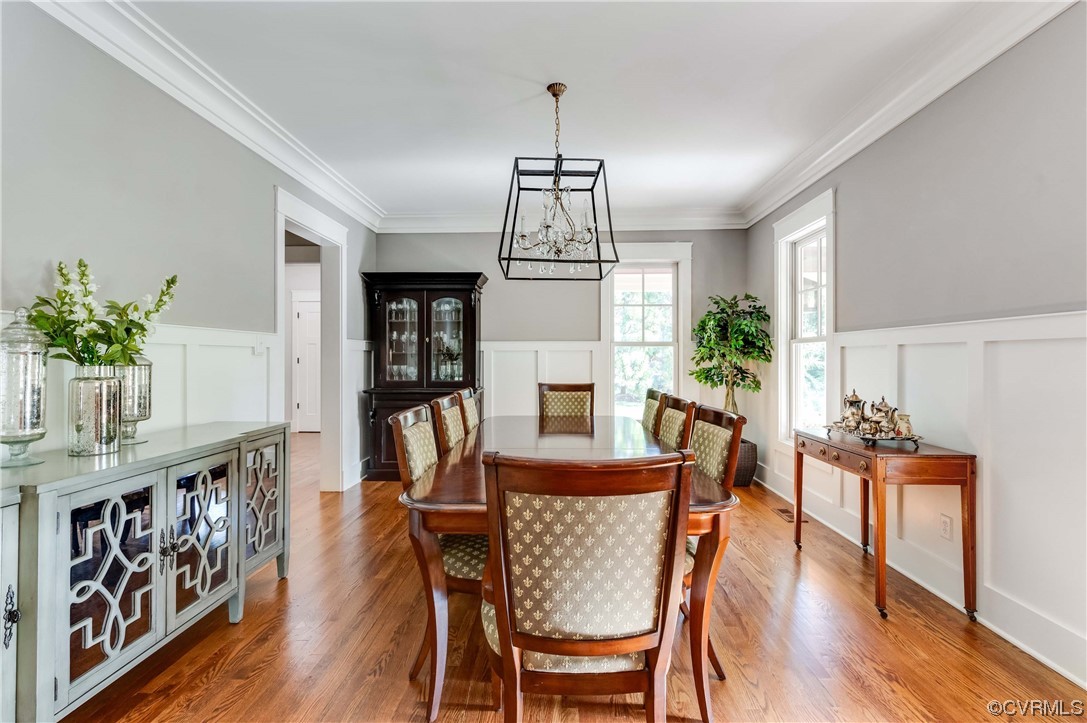 206 Running Cedar Lane Henrico, VA 23229 - Photo 5 of 33 a view of a dining room with furniture window and wooden floor