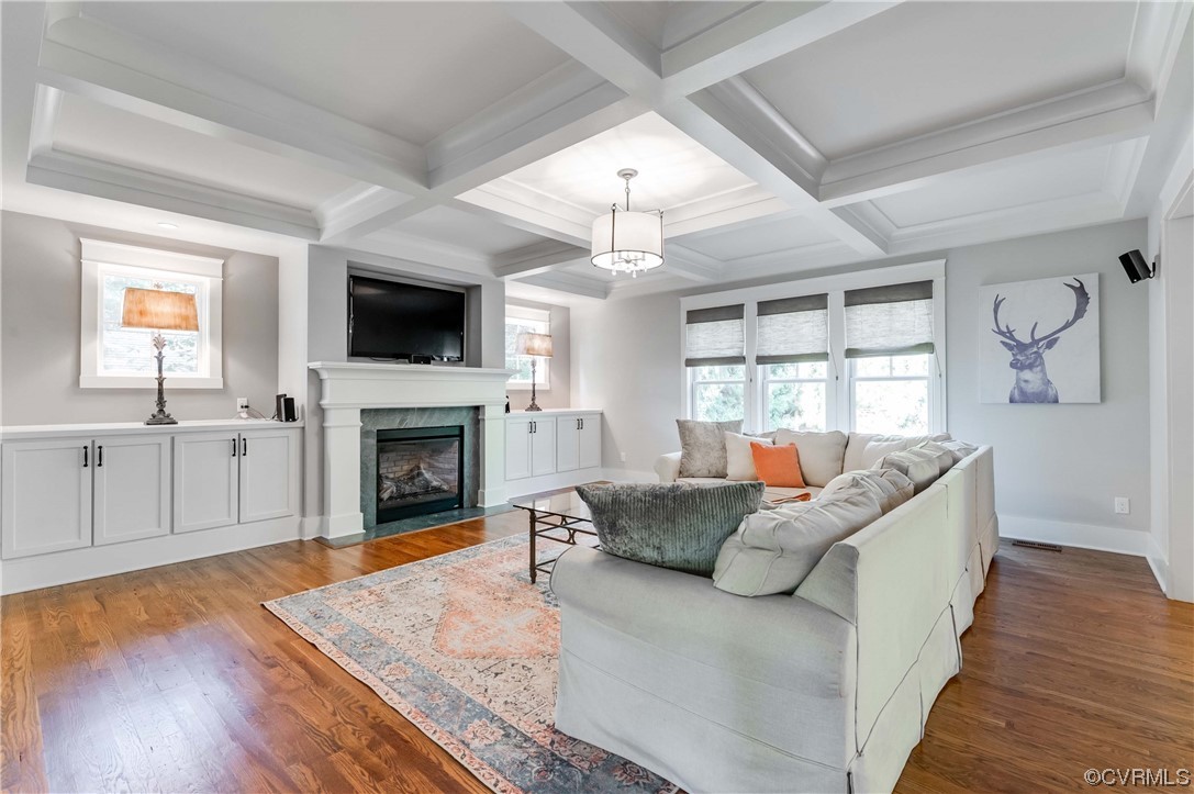 206 Running Cedar Lane Henrico, VA 23229 - Photo 7 of 33 a living room with furniture a flat screen tv and a fireplace