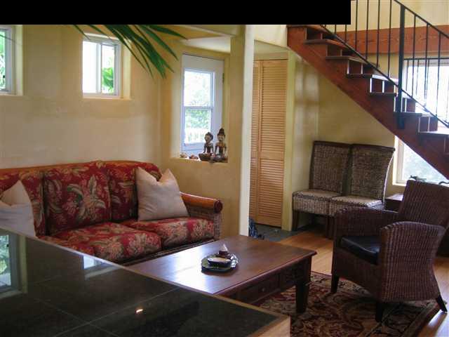 438 Kaupakalua Road Haiku, HI 96708 - Photo 4 of 18 a living room with furniture and a window