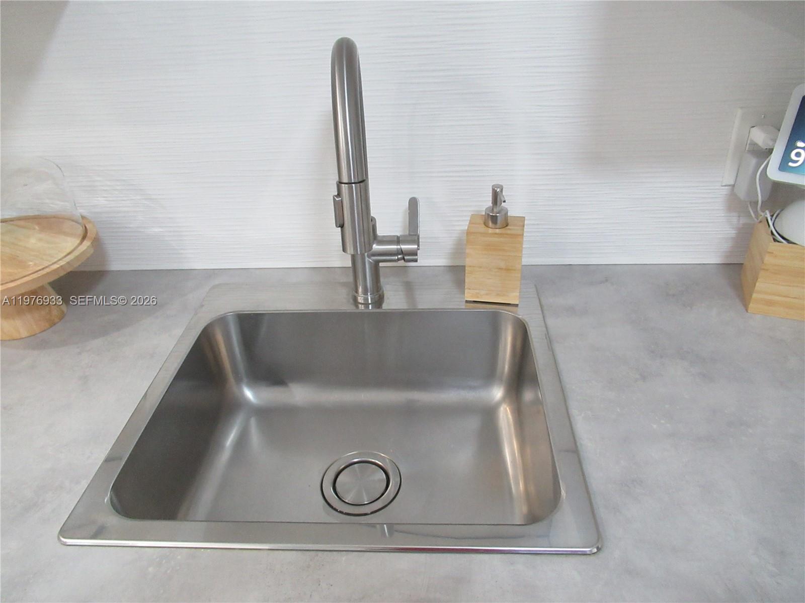 130 South Cypress Road, Unit 612 Pompano Beach, FL 33060 - Photo 27 of 33 a close view of sink