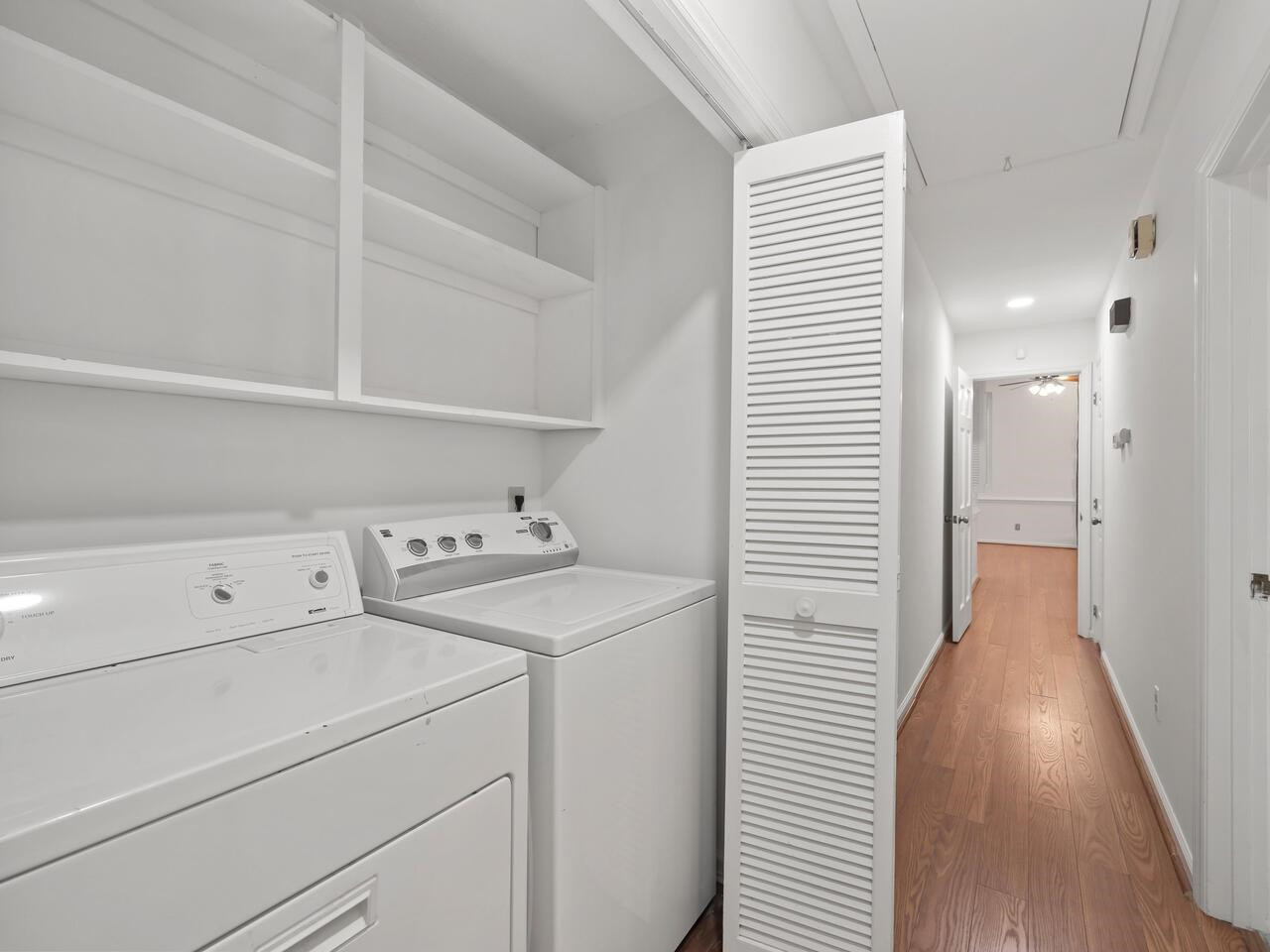 4504 Wenchelsea Place Raleigh, NC 27612 - Photo 12 of 27 a view of storage and utility room with washer and dryer