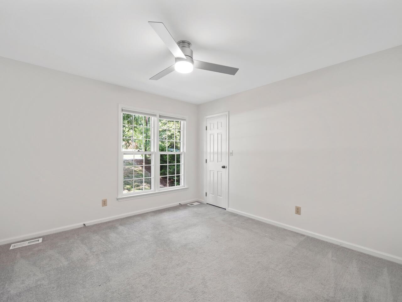 4504 Wenchelsea Place Raleigh, NC 27612 - Photo 14 of 27 a view of an empty room with a window