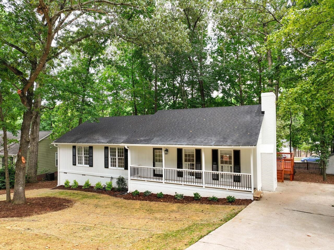 4504 Wenchelsea Place Raleigh, NC 27612 - Photo 27 of 27 front view of a house with a swimming pool