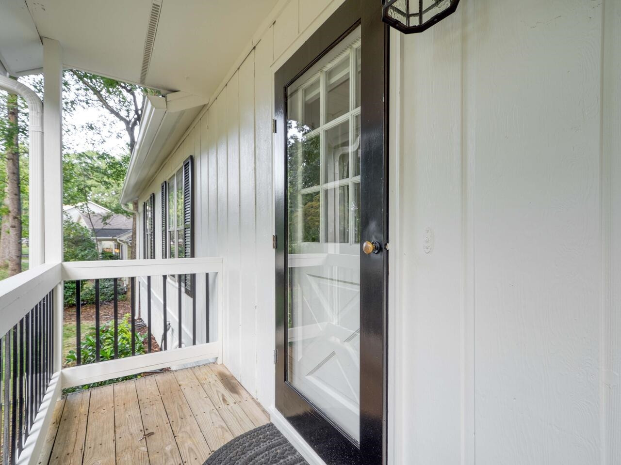 4504 Wenchelsea Place Raleigh, NC 27612 - Photo 5 of 27 a view of a balcony with wooden floor