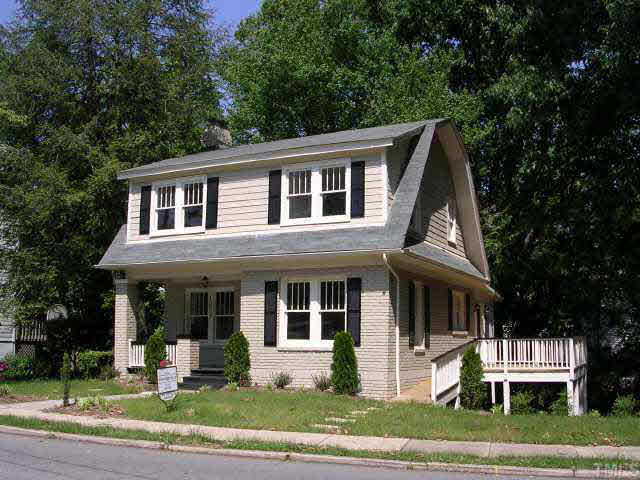 1837 White Oak Road Raleigh, NC 27608 - Photo 1 of 10 a front view of a house with a yard