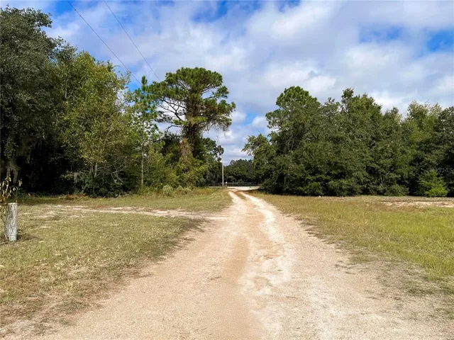 a picture of a building with a yard