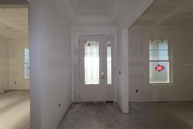 an empty room that has a bathroom