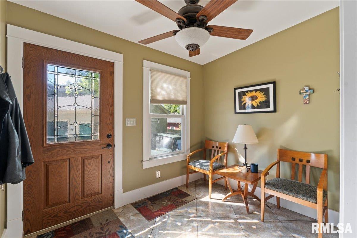101 South Stewart Street Geneseo, IL 61254 - Photo 16 of 41 a living room with furniture and a window