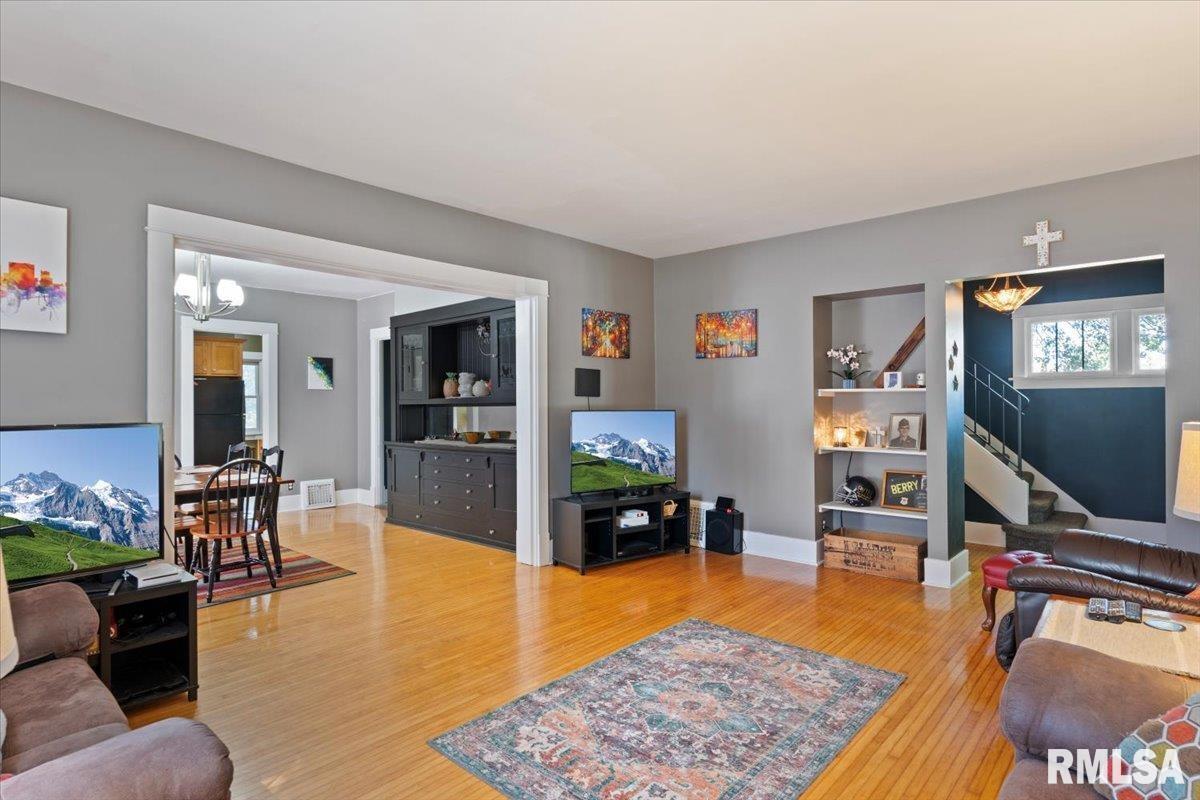101 South Stewart Street Geneseo, IL 61254 - Photo 23 of 41 a living room with furniture and a wooden floor