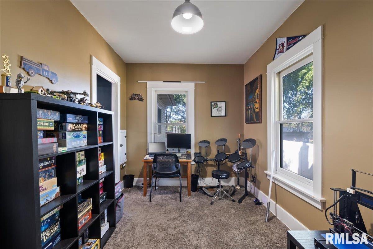 101 South Stewart Street Geneseo, IL 61254 - Photo 26 of 41 a view of a livingroom with furniture and windows