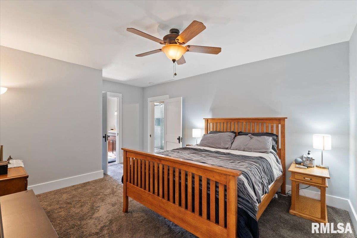 101 South Stewart Street Geneseo, IL 61254 - Photo 33 of 41 a bedroom with a bed and window