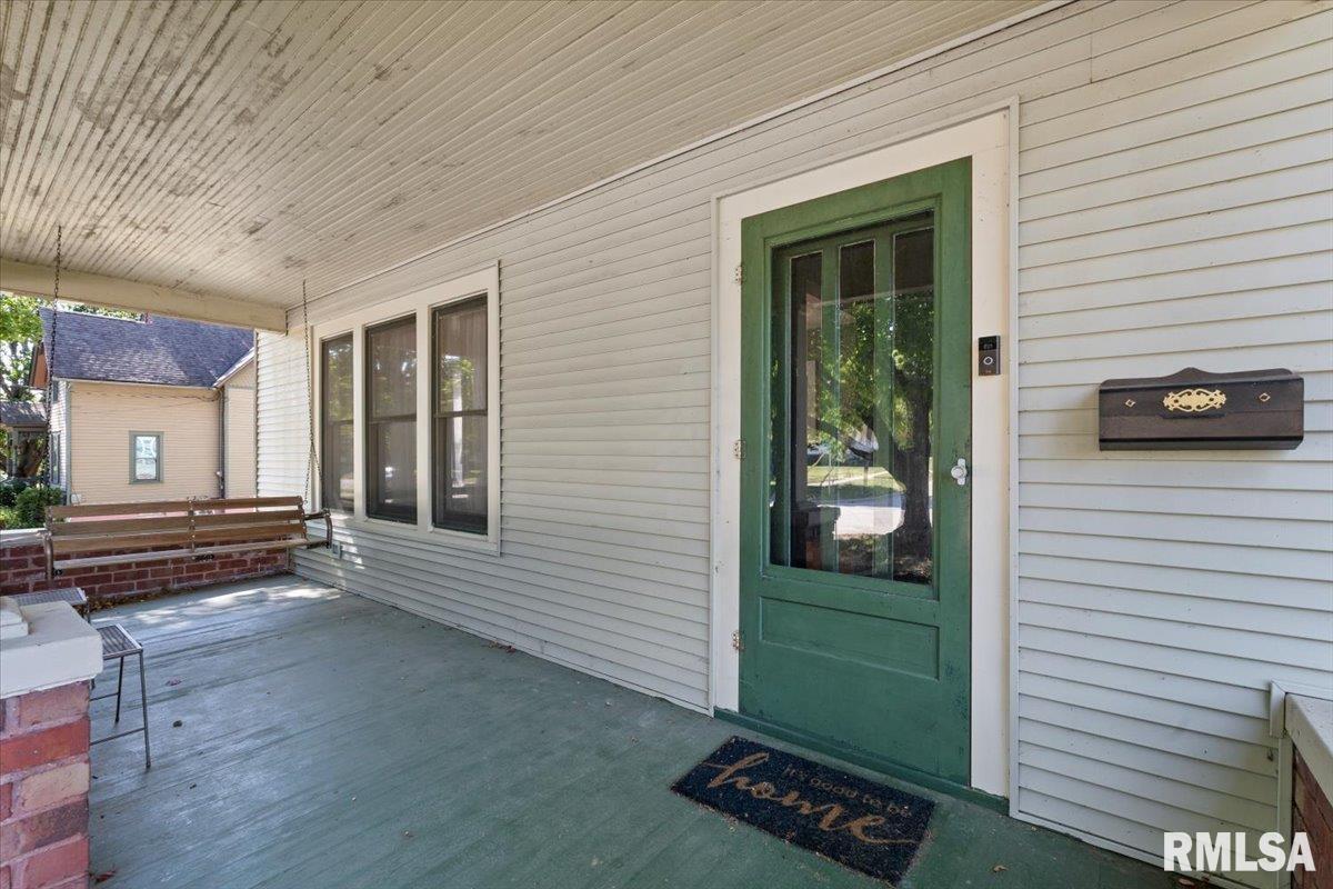 101 South Stewart Street Geneseo, IL 61254 - Photo 10 of 41 a view of a door and a window