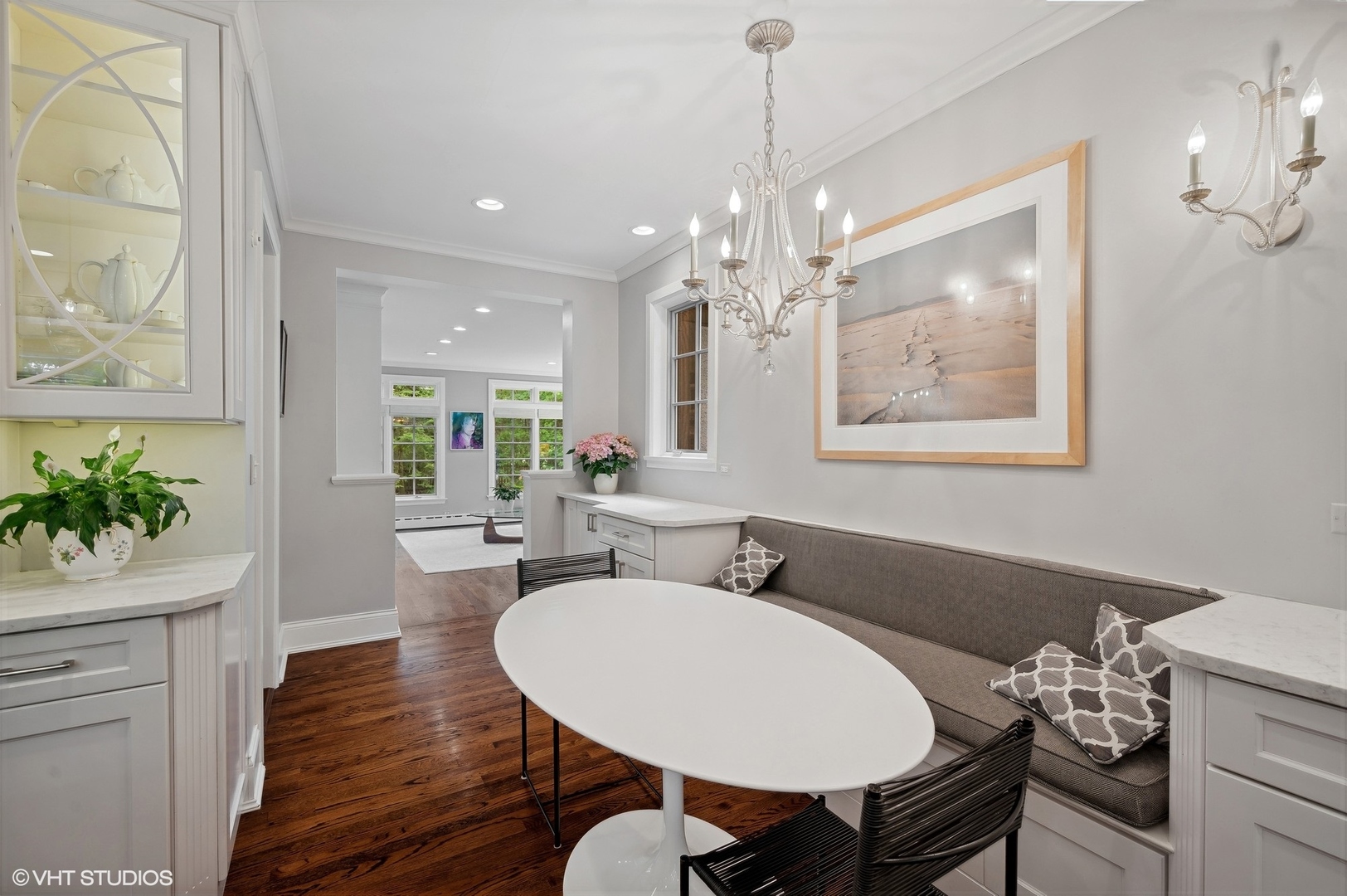888 Tower Road Winnetka, IL 60093 - Photo 11 of 80 a view of a dining room with furniture wooden floor and chandelier