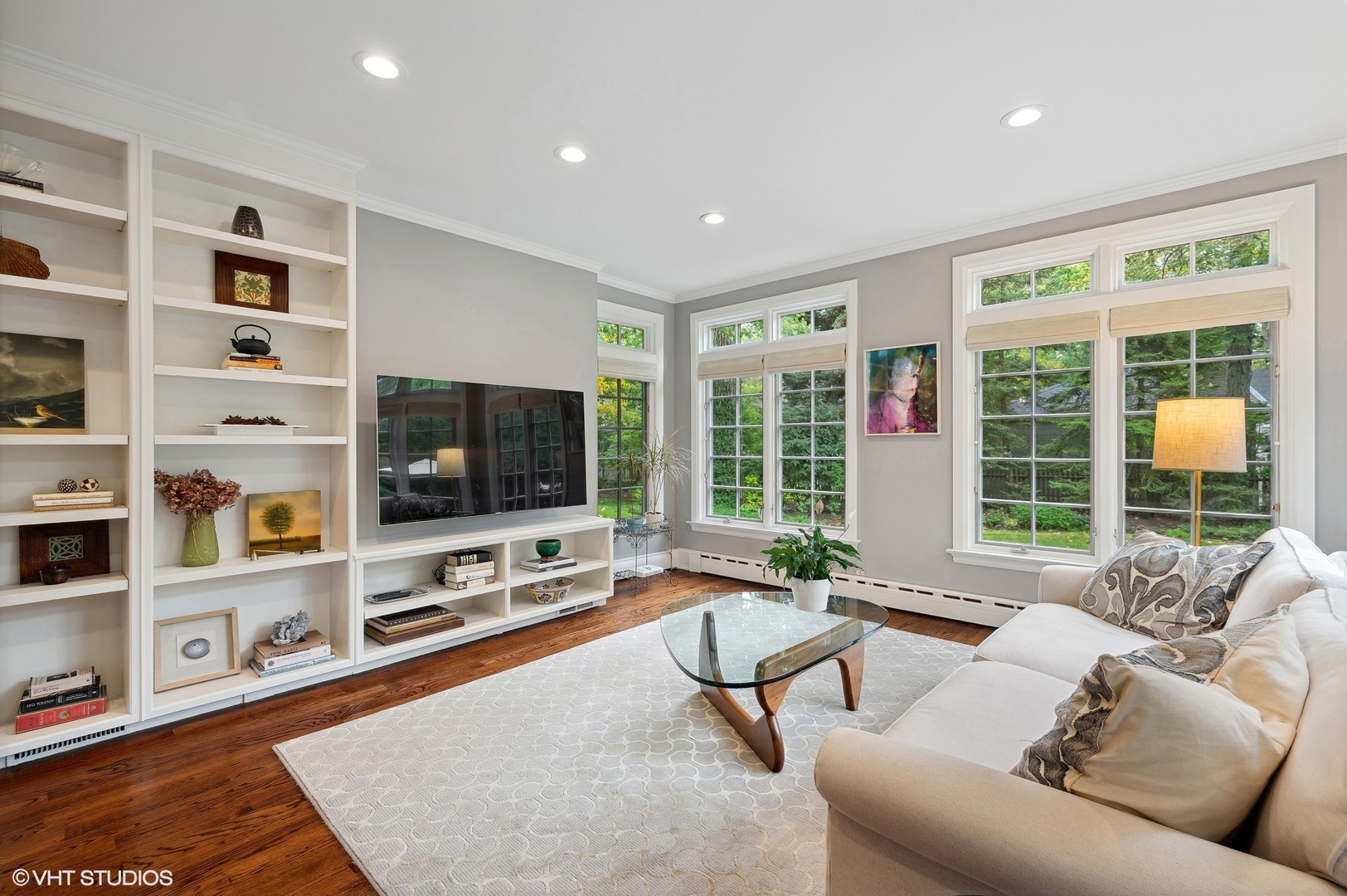 888 Tower Road Winnetka, IL 60093 - Photo 14 of 80 a living room with furniture and a flat screen tv