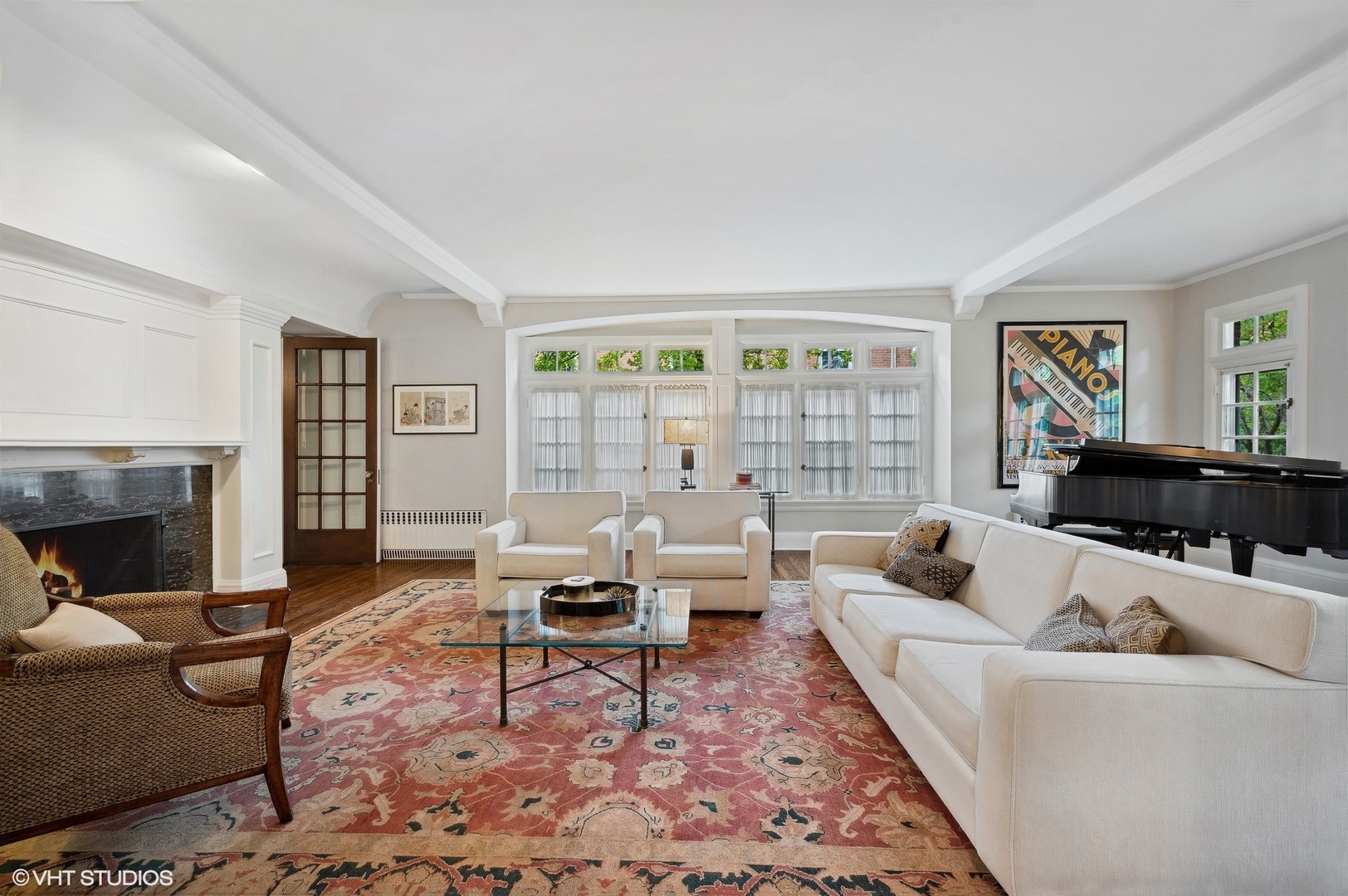 888 Tower Road Winnetka, IL 60093 - Photo 16 of 80 a living room with furniture and a fireplace