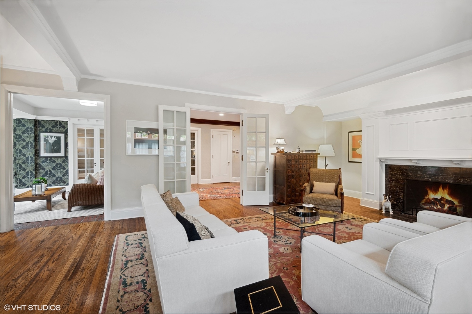 888 Tower Road Winnetka, IL 60093 - Photo 20 of 80 a living room with furniture and a fireplace