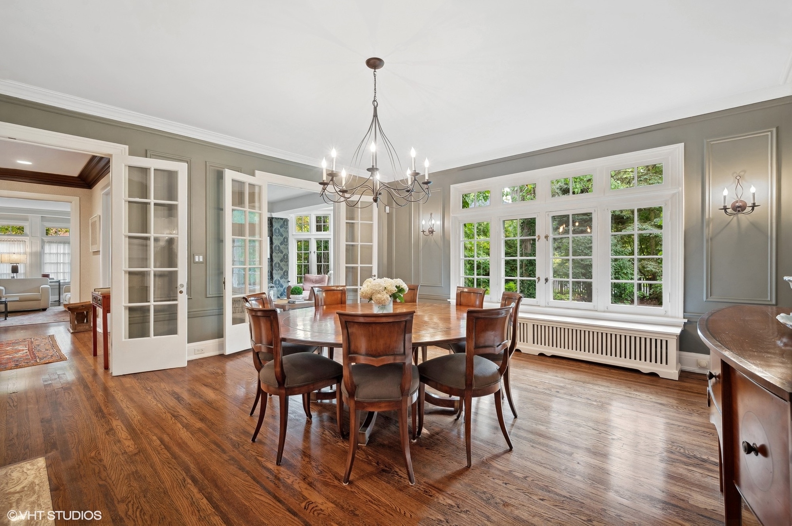 888 Tower Road Winnetka, IL 60093 - Photo 24 of 80 a view of a dining room with furniture window and wooden floor