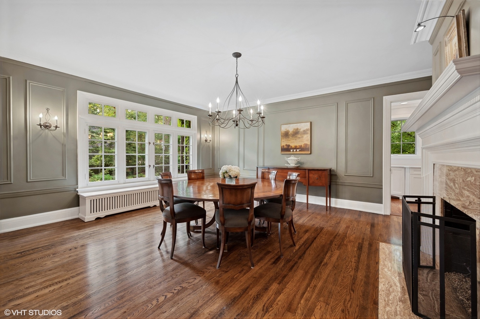 888 Tower Road Winnetka, IL 60093 - Photo 25 of 80 a view of a dining room with furniture window and wooden floor