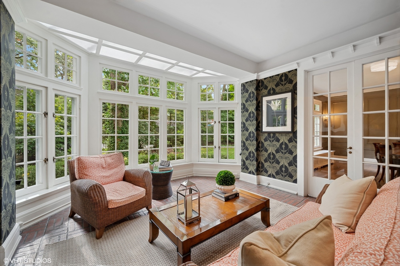 888 Tower Road Winnetka, IL 60093 - Photo 28 of 80 a living room with furniture and floor to ceiling windows and outer view