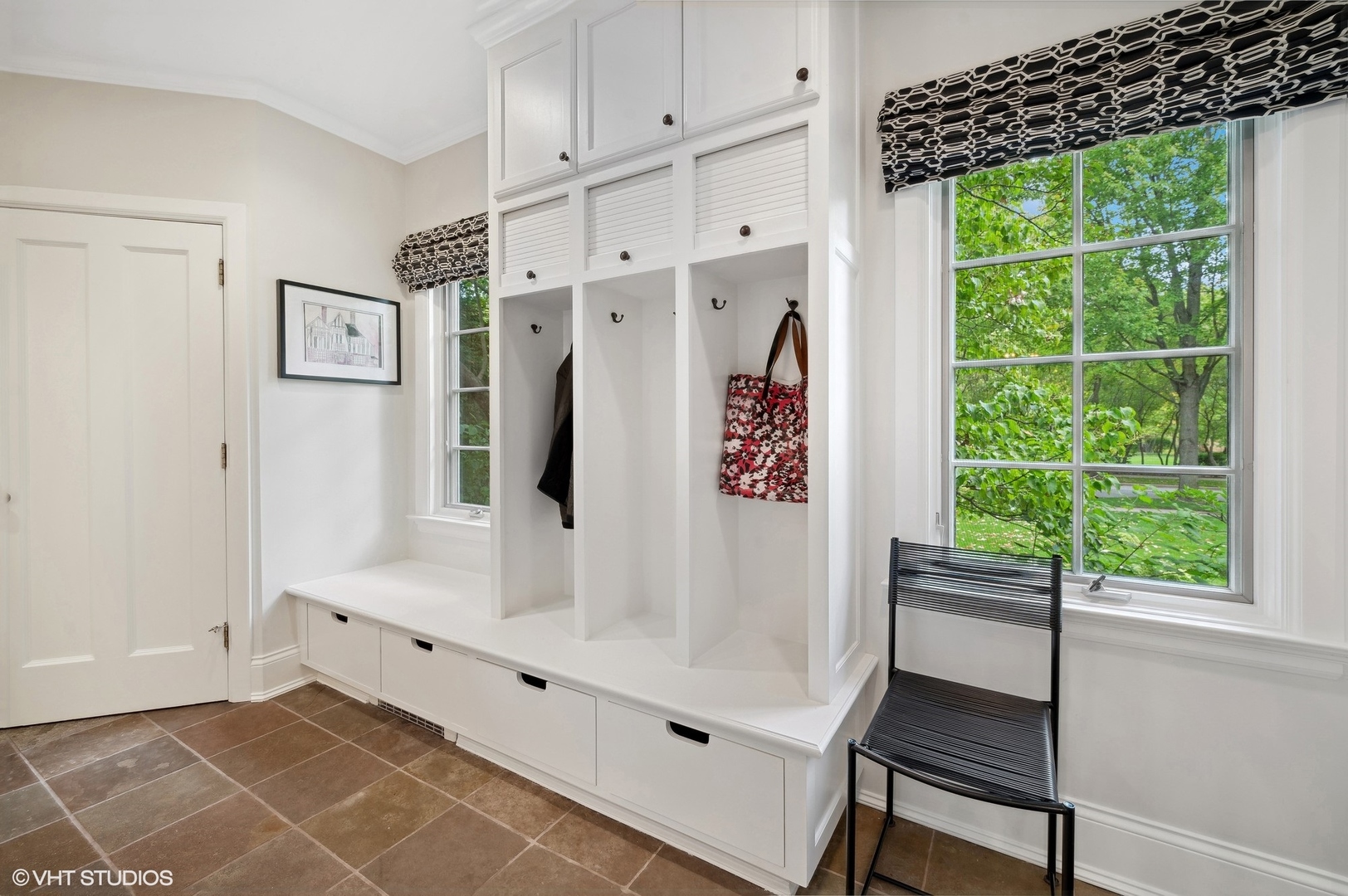 888 Tower Road Winnetka, IL 60093 - Photo 30 of 80 a bathroom with a bathtub and a window