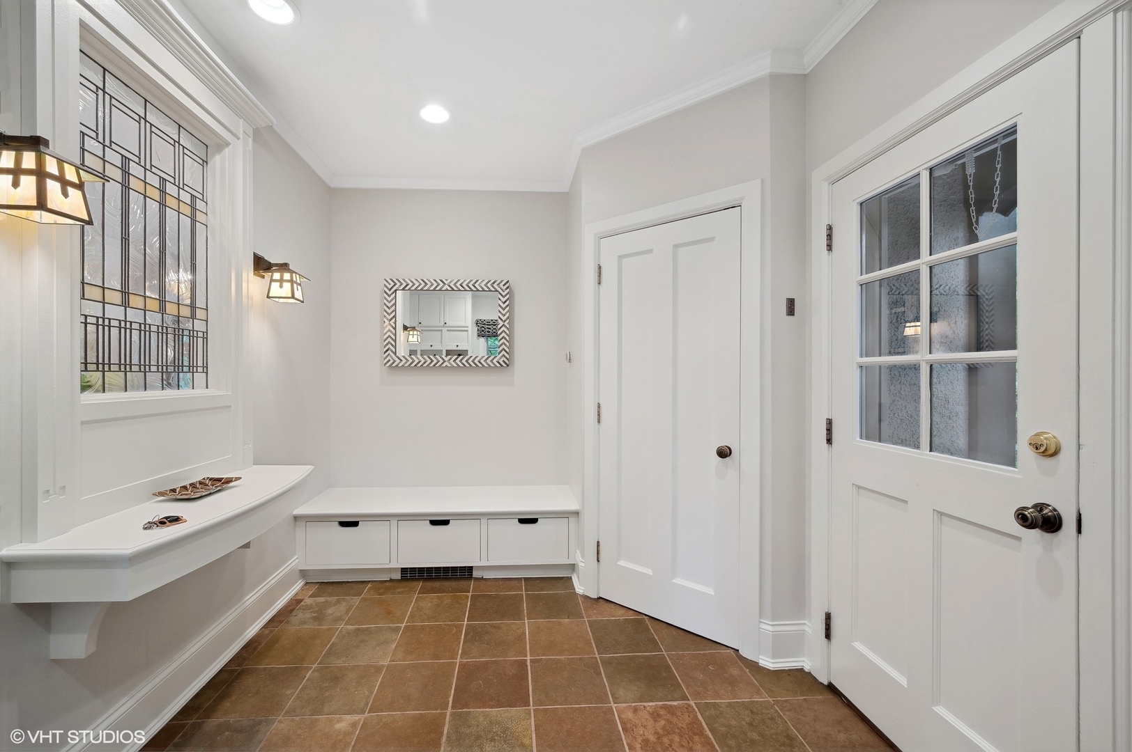 888 Tower Road Winnetka, IL 60093 - Photo 31 of 80 a bathroom with a bathtub sink and mirror