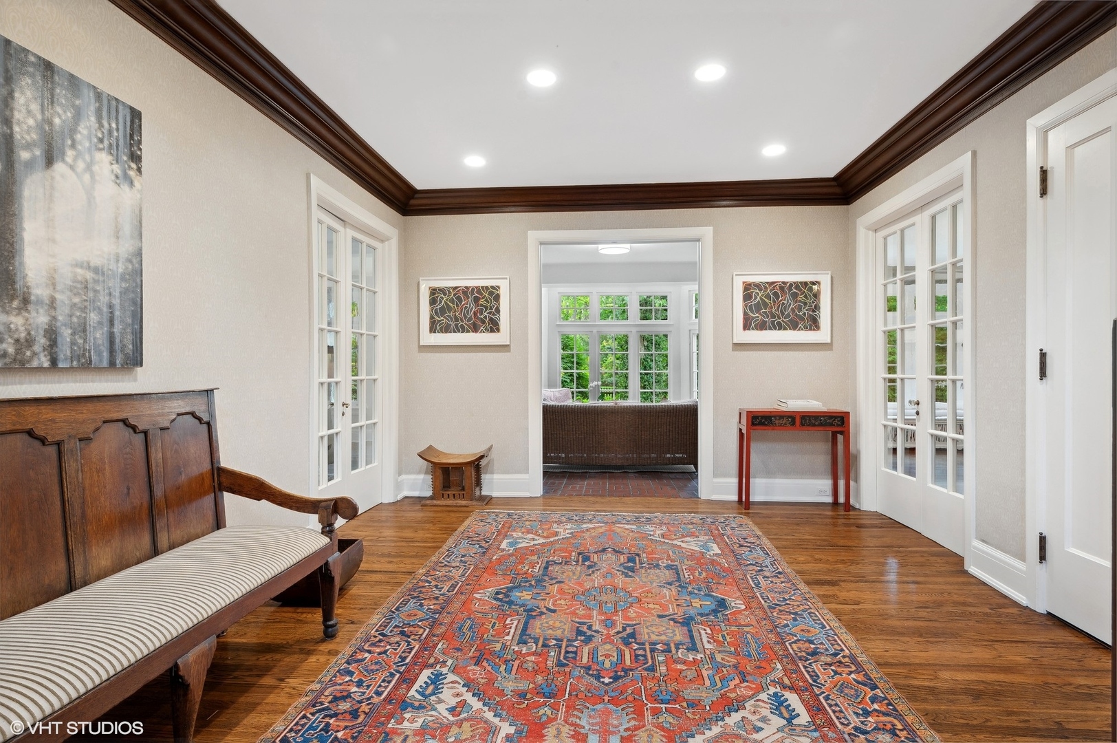 888 Tower Road Winnetka, IL 60093 - Photo 4 of 80 a spacious bedroom with a balcony a bed and a couch