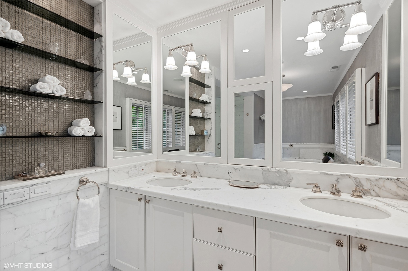 888 Tower Road Winnetka, IL 60093 - Photo 41 of 80 a bathroom with a sink double vanity and a mirror