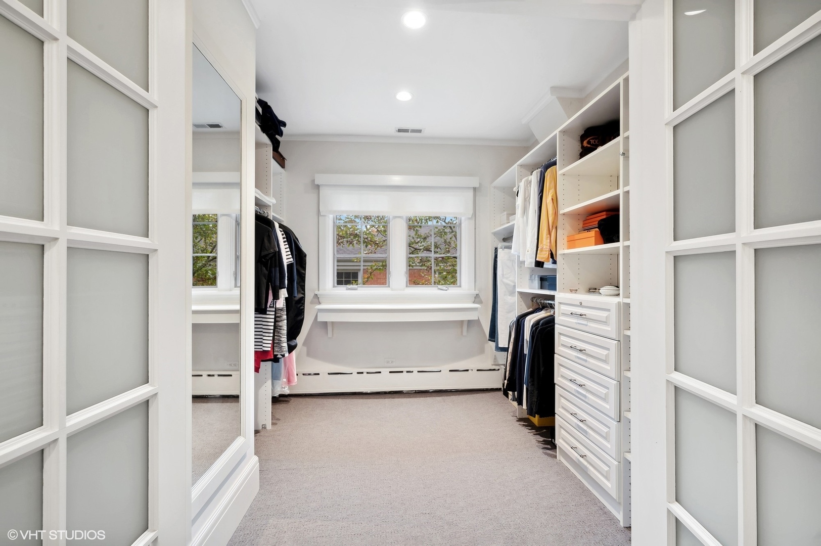 888 Tower Road Winnetka, IL 60093 - Photo 43 of 80 a view of walk in closet with clothes and shoes