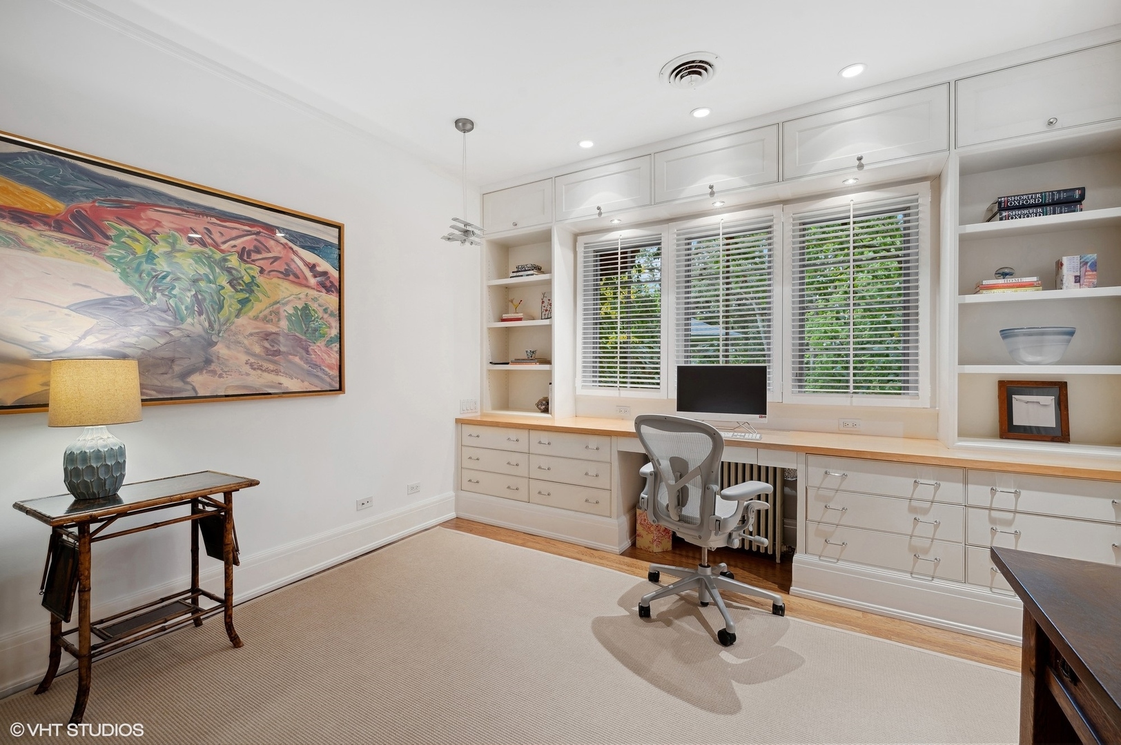 888 Tower Road Winnetka, IL 60093 - Photo 46 of 80 a view of a workspace with furniture and a window