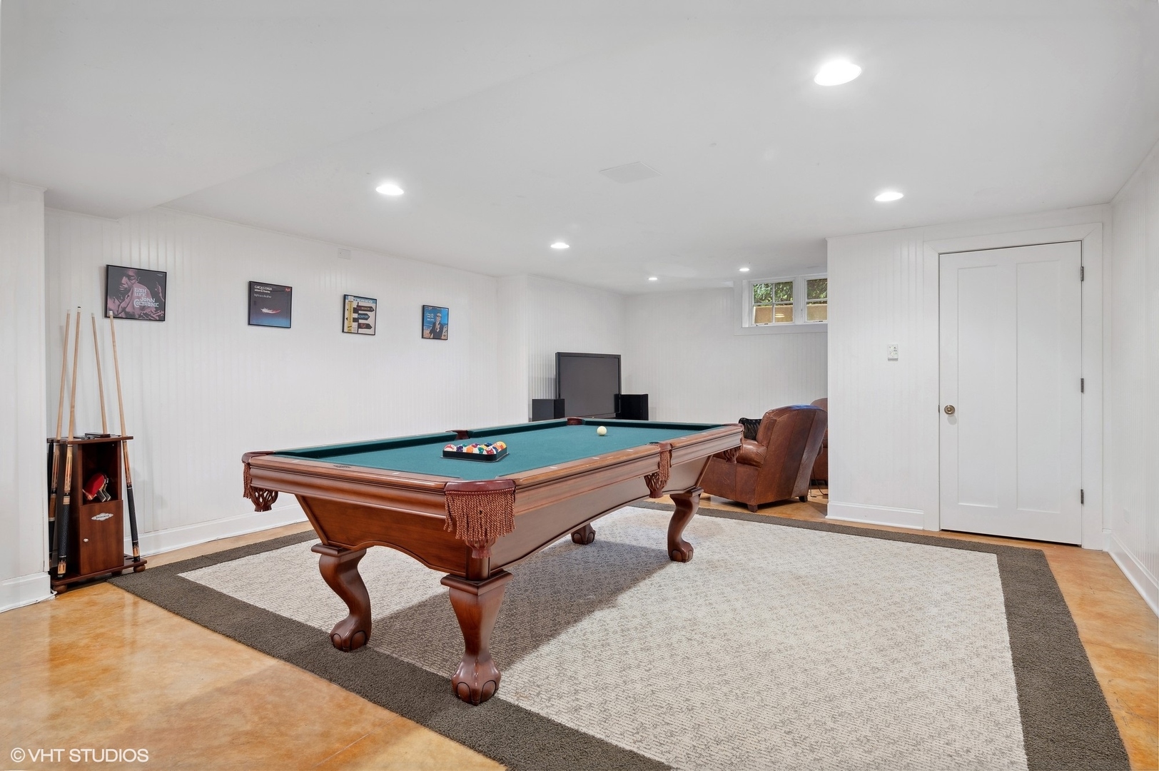888 Tower Road Winnetka, IL 60093 - Photo 62 of 80 a living room with furniture pool table and window