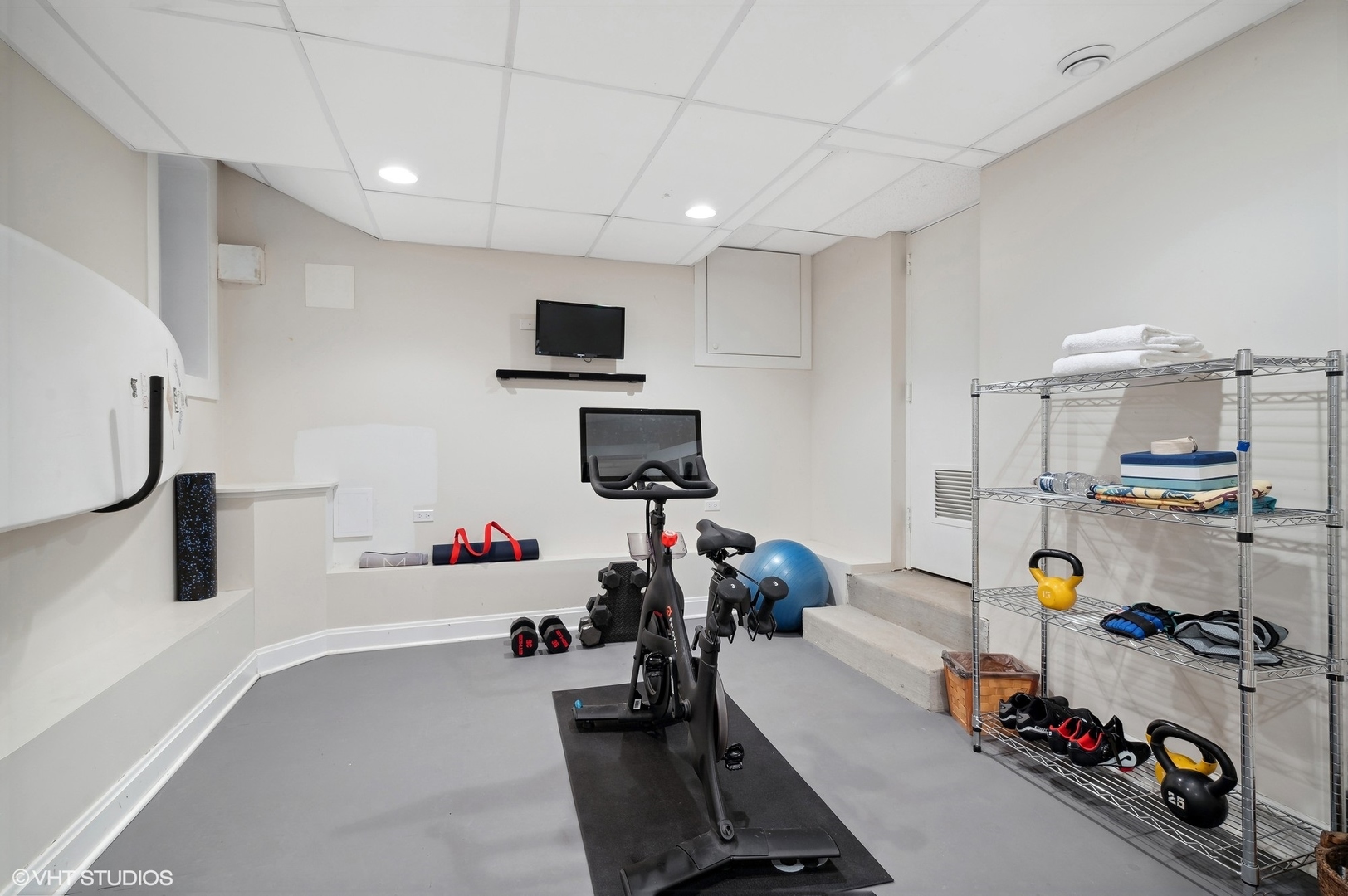 888 Tower Road Winnetka, IL 60093 - Photo 64 of 80 a room with furniture and a flat screen tv