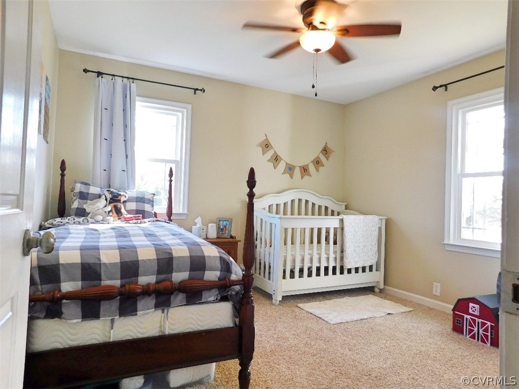 1926 Little Cub Road Pamplin, VA 23958 - Photo 16 of 32 a bedroom with a bed and window