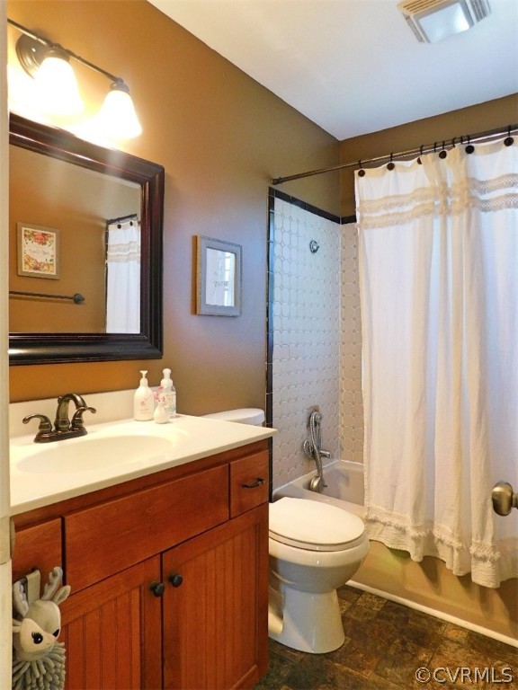 1926 Little Cub Road Pamplin, VA 23958 - Photo 19 of 32 a bathroom with a toilet sink and mirror