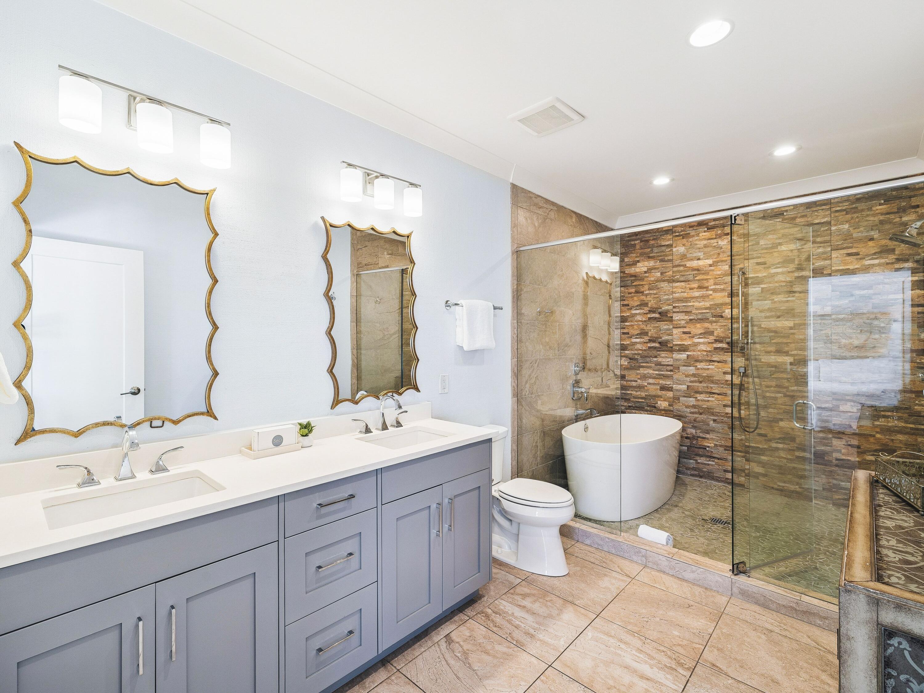 4659 Destiny Way Destin, FL 32541 - Photo 14 of 26 a bathroom with a double vanity sink mirror and toilet