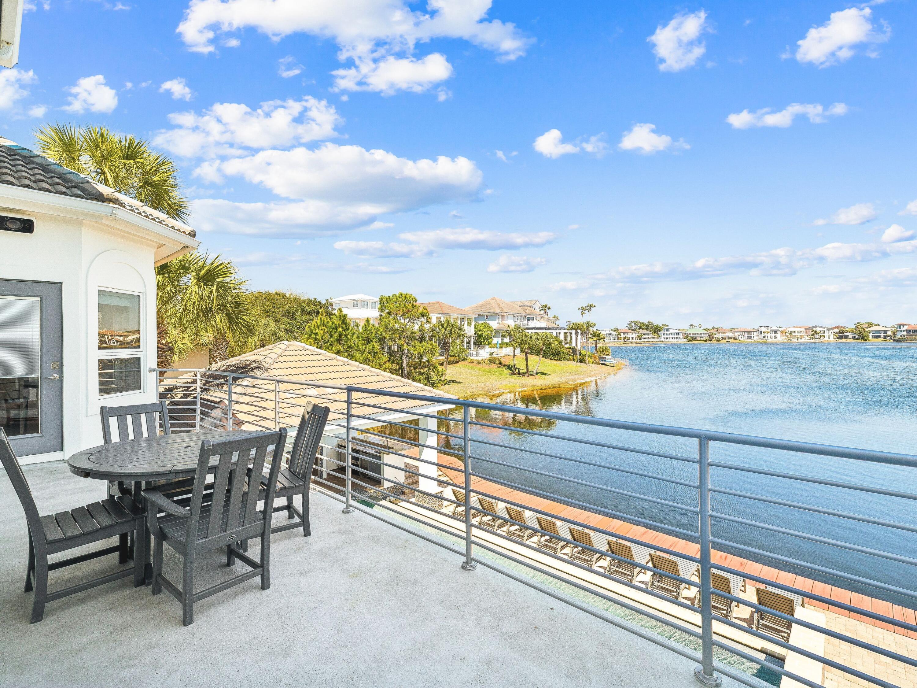 4659 Destiny Way Destin, FL 32541 - Photo 20 of 26 a view of a terrace with seating space