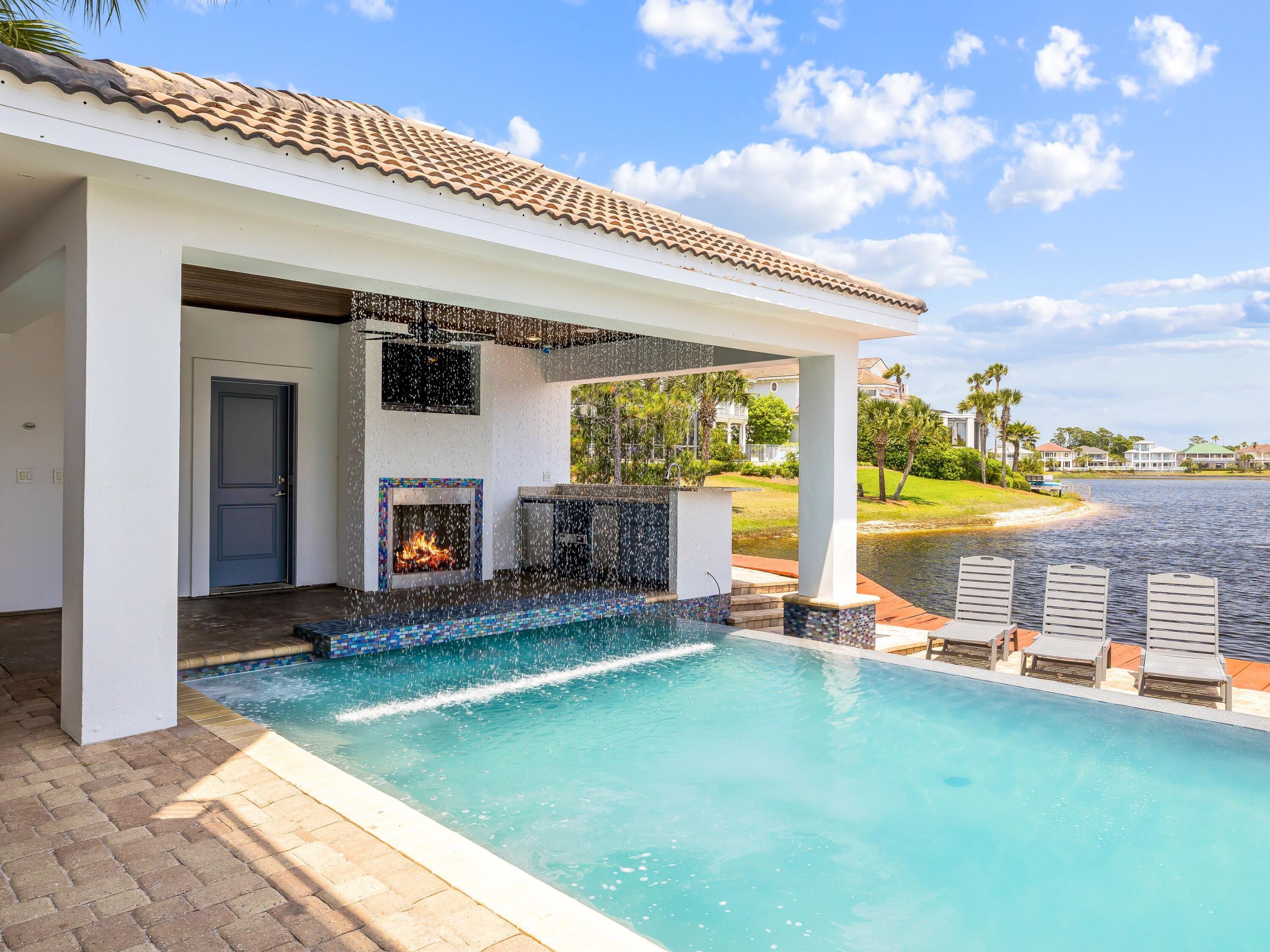 4659 Destiny Way Destin, FL 32541 - Photo 8 of 26 a view of a patio with a backyard