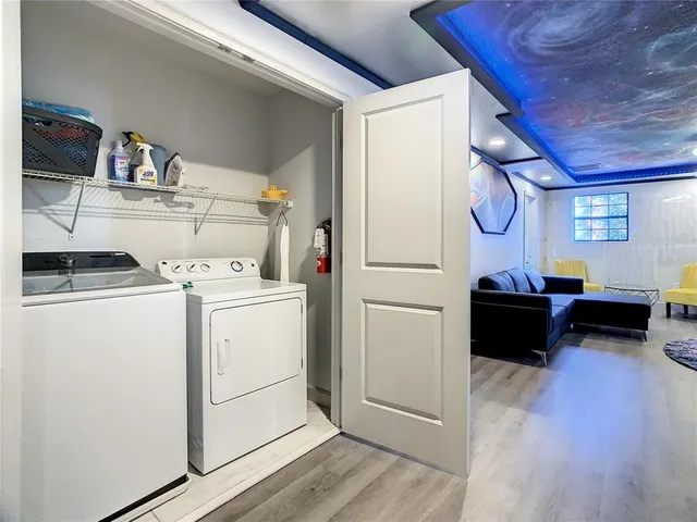a utility room with dryer and washer