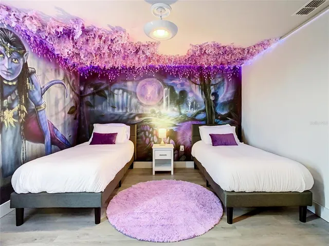 a bedroom with furniture and a bed