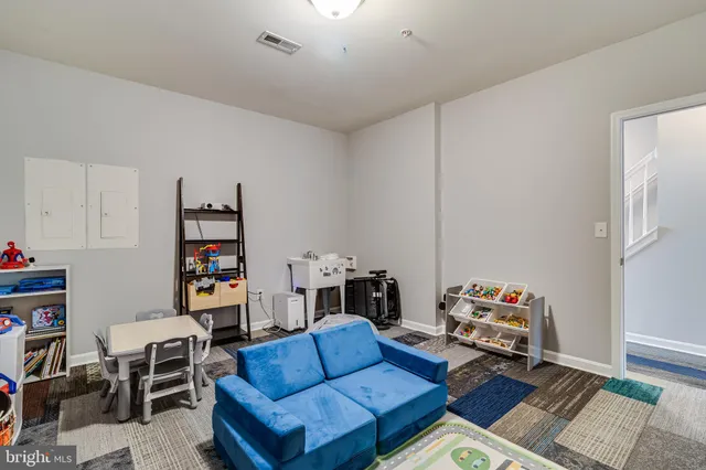a bathroom with a toilet and a sink