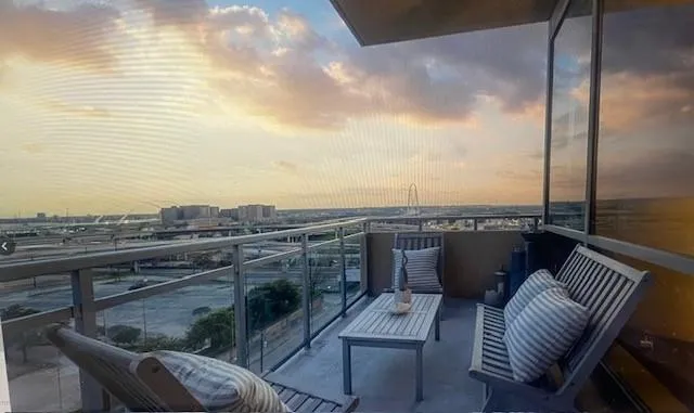 a view of roof deck with seating space