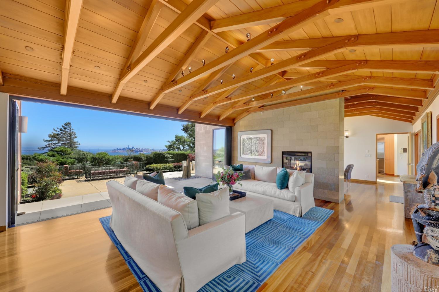 95 Cloud View Road Sausalito, CA 94965 - Photo 1 of 1 a living room with furniture and a large window