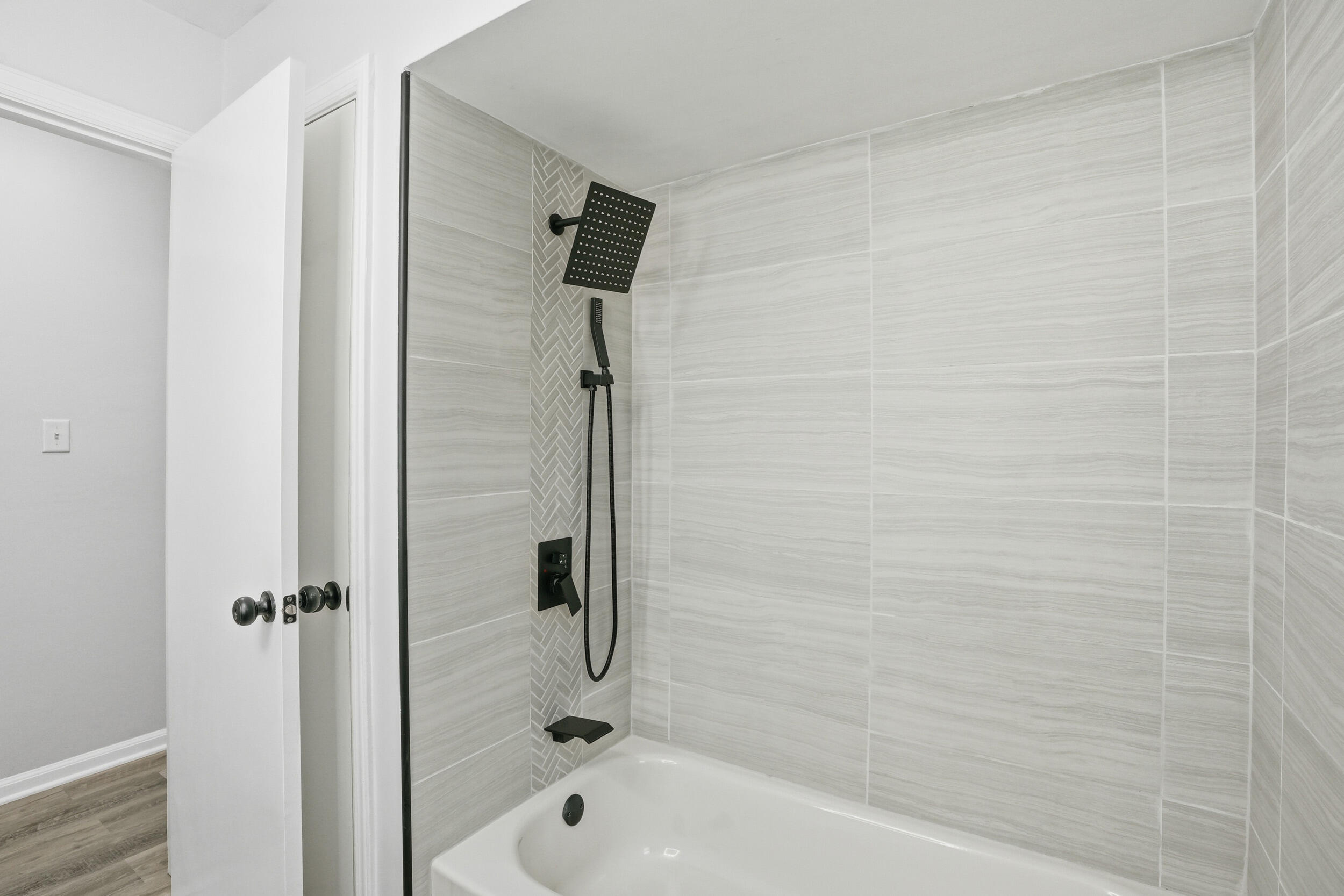 4800 Adams Street Gary, IN 46408 - Photo 14 of 24 a bathroom with a bathtub and a shower